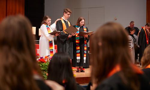 Reverend McCord on stage at baccalaureate