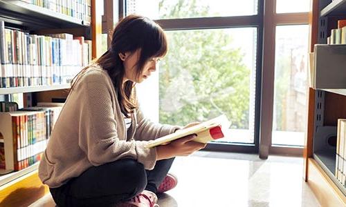 student reading a book