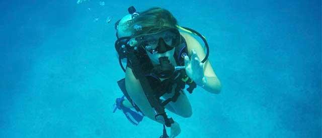 alumni student scuba diving